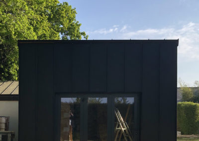 Construction d'un atelier en extension d'un garage à Saint-Etienne-de-Montluc